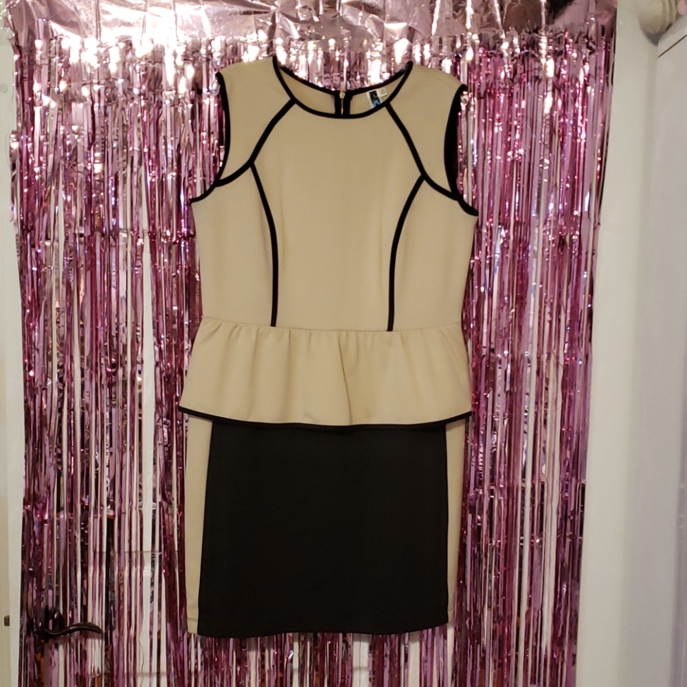 Black and nude peplum dress